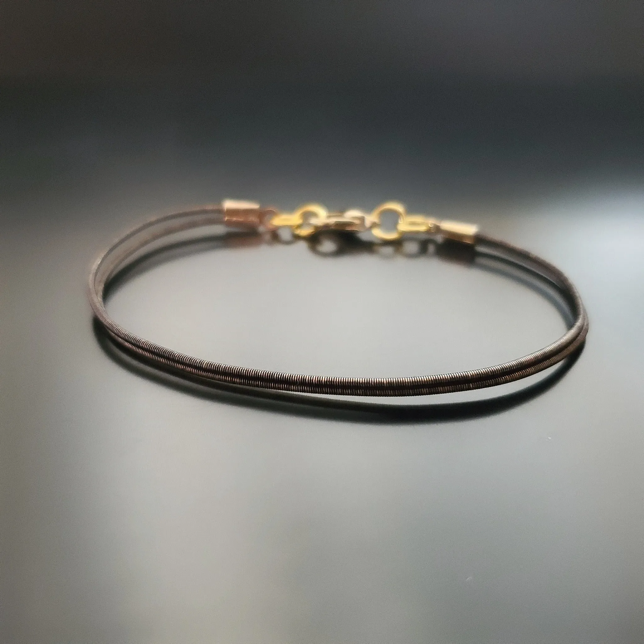 Harp String Clasp Style Bracelet
